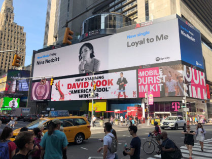 Spotify and Apple both took billboards in Times Square promoting the ...